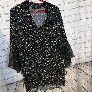 Women’s black floral print dress from the Zara Basic Collection. Ruffle sleeves